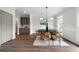 Elegant dining room with hardwood floors and natural light, perfect for Gathering gatherings at 1827 Shaker Falls Ln, Lawrenceville, GA 30045