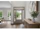 Elegant foyer with hardwood floors, decorative lighting, and a welcoming atmosphere at 1827 Shaker Falls Ln, Lawrenceville, GA 30045