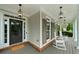 Inviting front porch with rocking chairs, perfect for relaxing and enjoying the neighborhood at 1827 Shaker Falls Ln, Lawrenceville, GA 30045