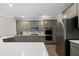 Kitchen with stainless steel appliances and plenty of counter and cabinet space at 1827 Shaker Falls Ln, Lawrenceville, GA 30045