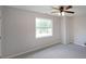 Bedroom with a ceiling fan and a window providing natural light at 2980 Porsche Nw Pl, Kennesaw, GA 30144