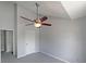 This bedroom has neutral walls and carpet plus a ceiling fan and nearby closet space at 2980 Porsche Nw Pl, Kennesaw, GA 30144