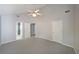 This bedroom has neutral walls and carpet plus multiple doors to nearby rooms at 2980 Porsche Nw Pl, Kennesaw, GA 30144
