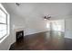 Spacious living room featuring a fireplace, hardwood floors, and ample natural light at 2980 Porsche Nw Pl, Kennesaw, GA 30144