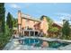 Enjoy the outdoors with a view of the in-ground pool in this spacious landscaped backyard at 3003 W Roxboro Rd, Atlanta, GA 30324