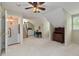 Bonus room featuring carpeted floors and space for seating and play at 3003 W Roxboro Rd, Atlanta, GA 30324