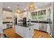 Well-lit kitchen with granite countertops and stainless steel appliances at 3003 W Roxboro Rd, Atlanta, GA 30324