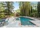 Enjoy the outdoors in this sparkling in-ground pool with surrounding patio and lounge chairs at 3003 W Roxboro Rd, Atlanta, GA 30324