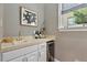 Convenient wet bar featuring a sink, wine cooler, and ample counter space, perfect for entertaining guests at 3003 W Roxboro Rd, Atlanta, GA 30324