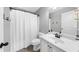 Contemporary bathroom featuring a walk in shower and a single sink vanity at 5950 Hidden Ridge Ct, Cumming, GA 30028