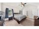 Comfortable bedroom showcasing a vaulted ceiling and modern furniture, providing a tranquil atmosphere at 5950 Hidden Ridge Ct, Cumming, GA 30028