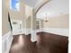 Lovely entryway and dining room featuring hardwood floors and an elegant chandelier at 5950 Hidden Ridge Ct, Cumming, GA 30028