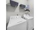 Functional laundry room with modern washer and dryer, offering convenience at 5950 Hidden Ridge Ct, Cumming, GA 30028