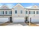 Charming townhome showcases craftsman architecture and a two-car garage at 6372 Rosetta Sw Dr, Atlanta, GA 30331