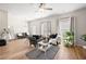 Light-filled living room featuring hardwood floors, neutral walls, and stylish furniture at 6372 Rosetta Sw Dr, Atlanta, GA 30331