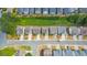 Birds-eye view of homes showing their rooflines, driveways, streets, and neighborhood landscaping at 1703 Bentridge Nw Dr, Kennesaw, GA 30144