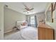 Comfortable bedroom featuring a crib, neutral walls, and a circular rug at 1703 Bentridge Nw Dr, Kennesaw, GA 30144