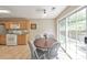 Bright breakfast nook with sliding glass doors to the outdoor patio at 1703 Bentridge Nw Dr, Kennesaw, GA 30144