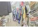 Spacious walk-in closet with ample storage and shelving for organized living at 1703 Bentridge Nw Dr, Kennesaw, GA 30144