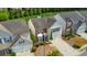 Exterior view of home featuring lush landscaping, a two-car garage, and a welcoming front entrance at 1703 Bentridge Nw Dr, Kennesaw, GA 30144