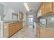 Functional kitchen with wooden cabinets, granite countertops, and stainless steel appliances at 1703 Bentridge Nw Dr, Kennesaw, GA 30144