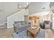Open-concept living room showcases stairs and a view of the kitchen at 1703 Bentridge Nw Dr, Kennesaw, GA 30144