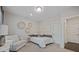 Cozy bedroom with soothing colors, features a reading nook, creating a relaxing and inviting space at 2062 Cortland Rd, Milton, GA 30009