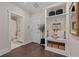 This welcoming entryway features a mudroom with built-ins and a convenient entry to the bath at 2062 Cortland Rd, Milton, GA 30009
