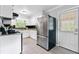Bright kitchen features stainless steel appliances and white cabinets at 2337 Elmwood Se Cir, Atlanta, GA 30339