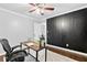 Inviting office space featuring a modern desk and a soft, decorative rug at 2337 Elmwood Se Cir, Atlanta, GA 30339