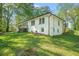 Charming home showcasing well-maintained landscaping and a welcoming front porch area at 2529 Ryne St, Atlanta, GA 30318