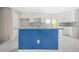 Modern kitchen with granite countertops, white cabinets and stainless steel appliances at 2529 Ryne St, Atlanta, GA 30318