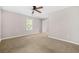 Spacious main bedroom featuring plush carpeting and neutral walls at 2529 Ryne St, Atlanta, GA 30318