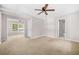 The large main bedroom has neutral walls and carpet and access to the bathroom at 2529 Ryne St, Atlanta, GA 30318