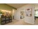 Upstairs hallway with wall decorations, interior doors, and carpeted floors at 4960 Jatoba Rd, Acworth, GA 30101