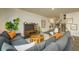 Cozy living space with a large sectional, stylish furniture, and modern decor, enhancing comfort at 4960 Jatoba Rd, Acworth, GA 30101
