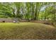 Picture of a large back yard with a full privacy fence, chairs for relaxing and plenty of room to roam at 1866 Tiger Flowers Nw Dr, Atlanta, GA 30314