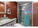 This bathroom features granite countertop and a clear sliding glass shower at 1866 Tiger Flowers Nw Dr, Atlanta, GA 30314