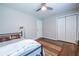 The bedroom has hardwood floors and double closets for storage at 1866 Tiger Flowers Nw Dr, Atlanta, GA 30314