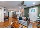 Open concept living room flowing into a kitchen with hardwood floors and recessed lighting at 1866 Tiger Flowers Nw Dr, Atlanta, GA 30314