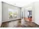 Bright living room with slate tile flooring and a large window with natural light at 2625 Blackstock Dr, Cumming, GA 30041