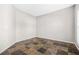 Neutral colored room with slate tile flooring and natural light from window at 2625 Blackstock Dr, Cumming, GA 30041
