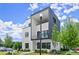 Striking exterior of a modern home showcasing a balcony, fresh landscaping and beautiful architectural design at 326 Treble Way, Alpharetta, GA 30009