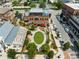Aerial view of community features a green space surrounded by walkable paths, shops, and outdoor seating at 435 Mezzo Ln # 86, Alpharetta, GA 30009