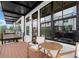 Cozy outdoor balcony features a table and chairs, along with views of the surrounding neighborhood at 435 Mezzo Ln # 86, Alpharetta, GA 30009