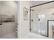 Elegant bathroom with marble-style shower, toilet, and modern fixtures at 435 Mezzo Ln # 86, Alpharetta, GA 30009