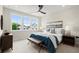 Bright bedroom featuring three windows, a ceiling fan, and a stylish decor at 435 Mezzo Ln # 86, Alpharetta, GA 30009