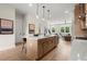 Modern kitchen boasts an island with seating and an open layout for easy entertaining at 435 Mezzo Ln # 86, Alpharetta, GA 30009