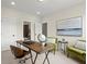 Home office features a modern desk, neutral walls, and comfortable seating at 435 Mezzo Ln # 86, Alpharetta, GA 30009
