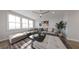 Cozy living room with large windows, comfortable seating, and a stylish rug at 435 Mezzo Ln # 86, Alpharetta, GA 30009